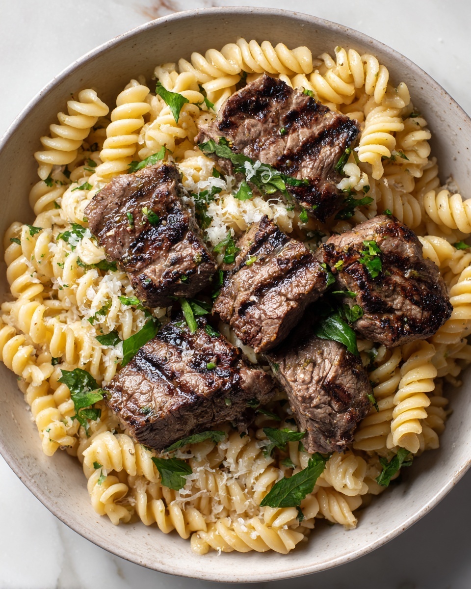 Garlic Parmesan Steak Bites with Rotini Pasta Recipe - Recipe Image