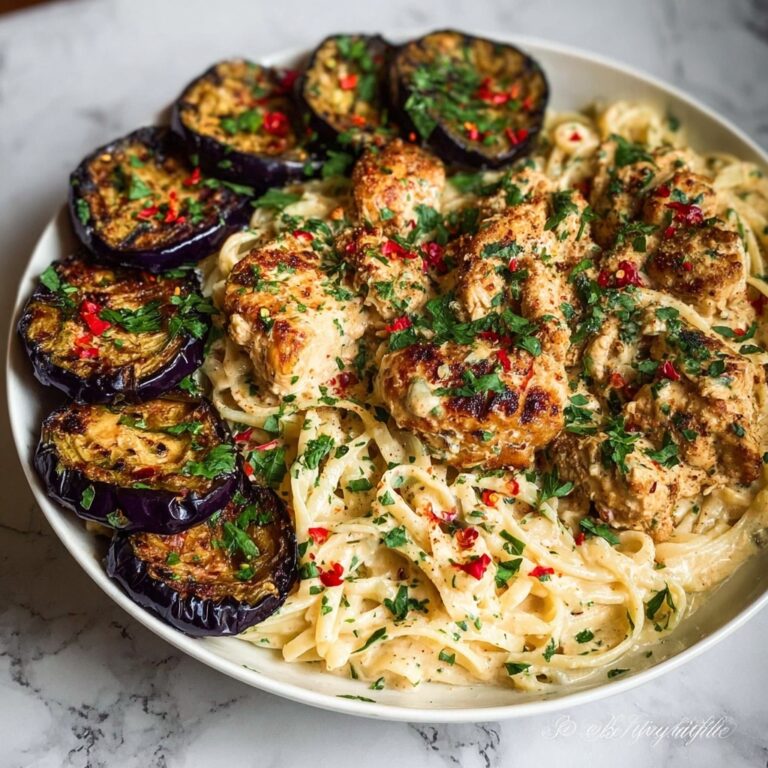 Spicy Whipped Feta Chicken Alfredo with Crispy Eggplant Wedges & Chili Oil Drizzle Recipe